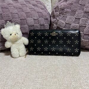 Coach Black Zip-Around Wallet with Gold Stud Flower Accents